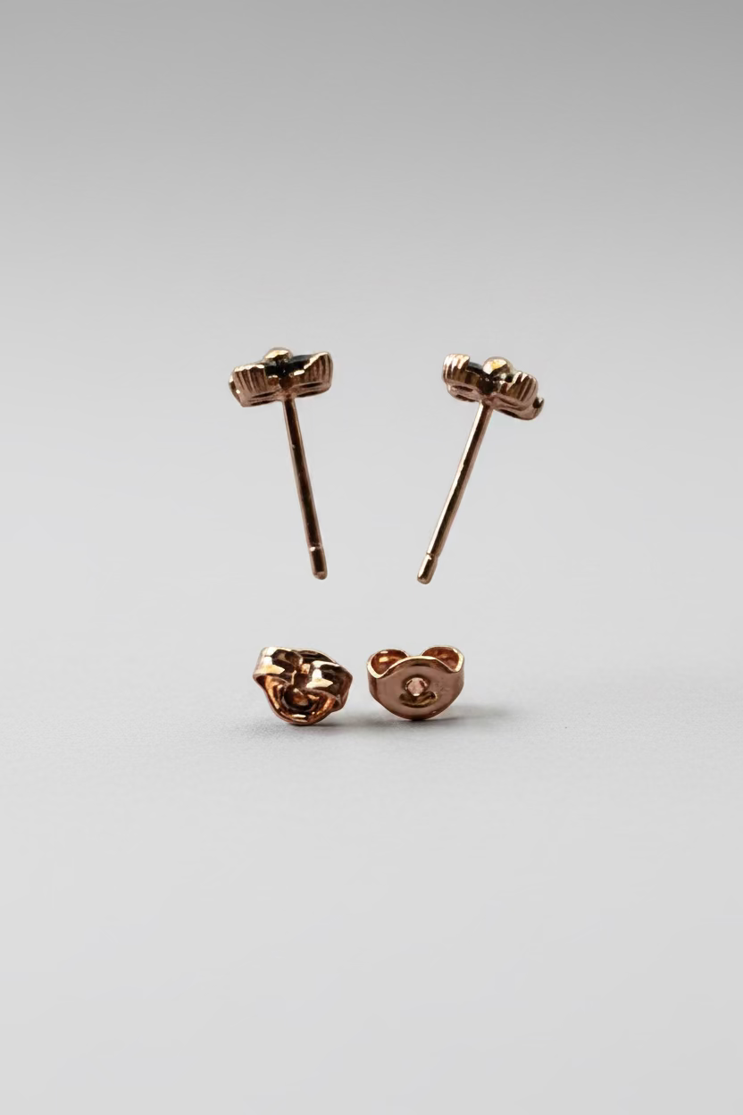 925 sterling silver post and butterfly back closure on rose gold stud earrings_blackflower