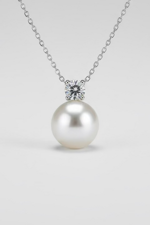 Close-up of 11-12mm Australian South Sea pearl mirror-like luster on Diana pendant cold white silver overtone