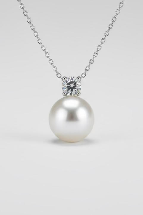 Close-up of 11-12mm Australian South Sea pearl mirror-like luster on Diana pendant cold white silver overtone