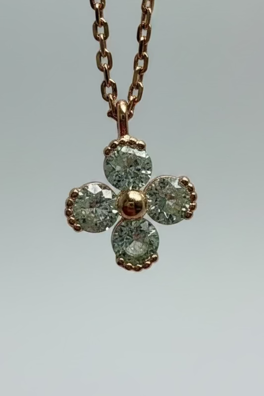 Close-up of 4 leaf clover pendant with diamonds 1cm x 1cm rose gold 925 silver Korean necklace