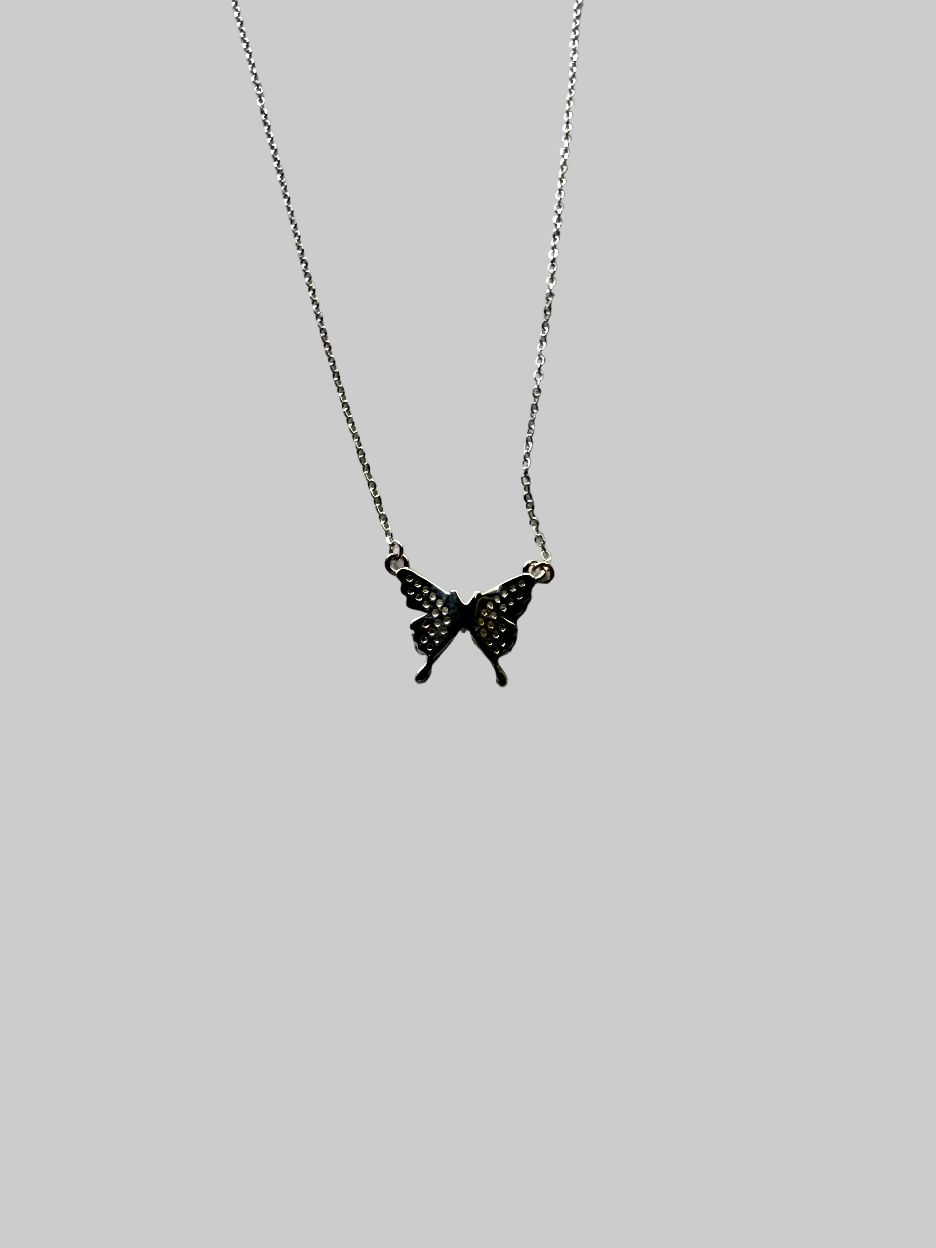 Close-up of butterfly pendant full diamond setting 2cm x 1cm 925 silver Korean jewelry_back