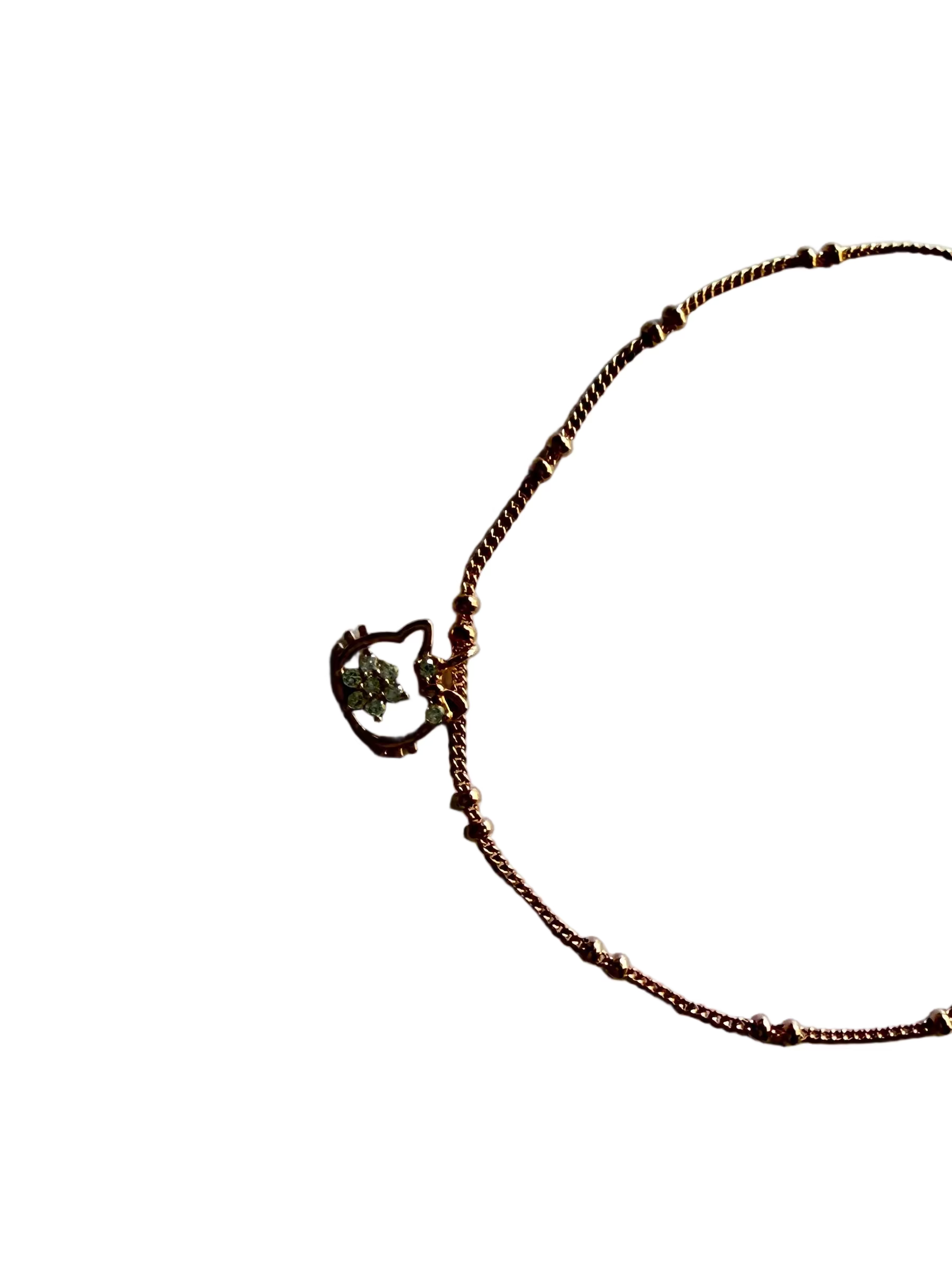 Close-up of cat pendant with diamonds 1cm x 1cm rose gold 925 silver Korean bracelet_side