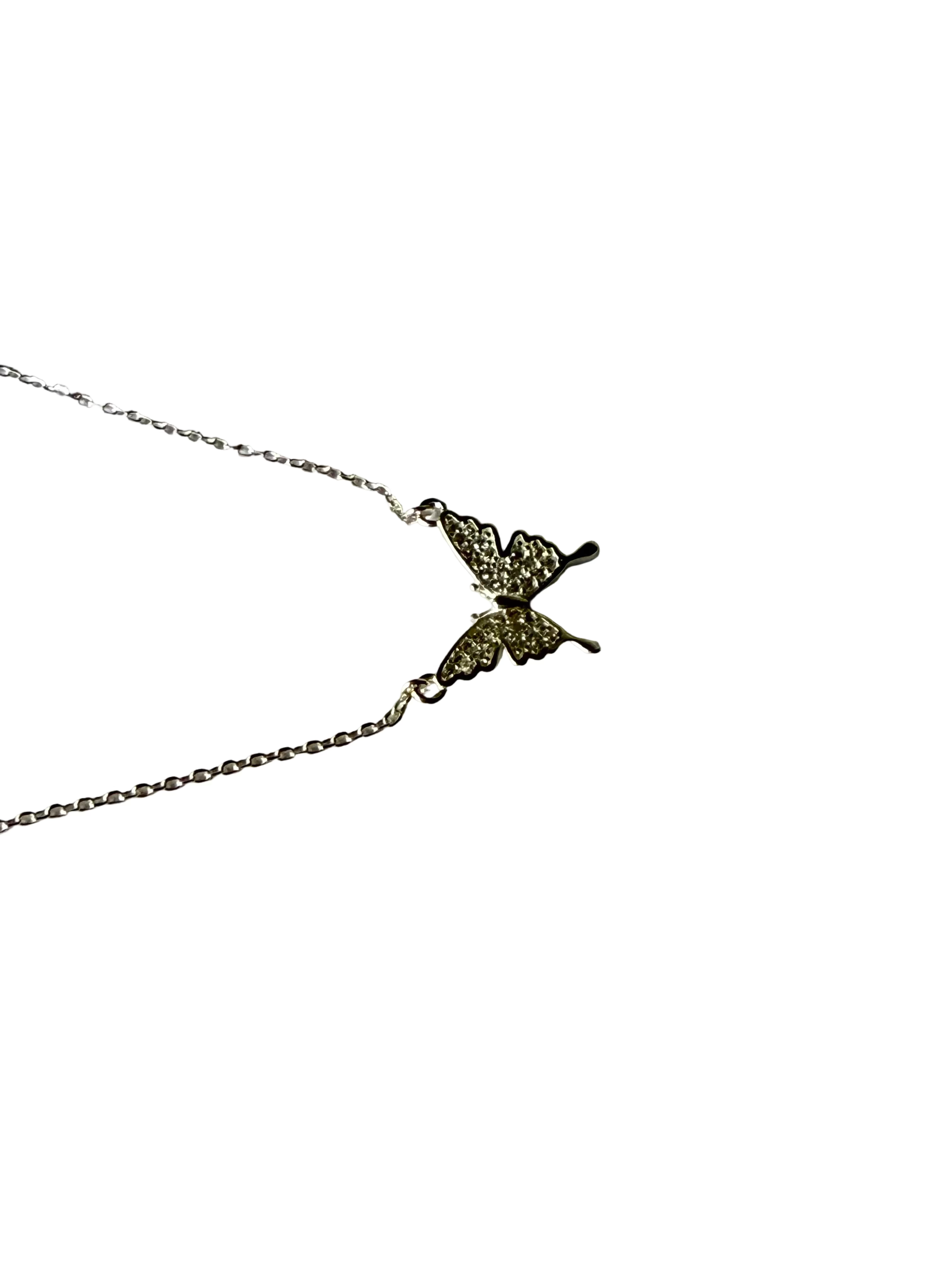 Side view of butterfly diamond necklace silver pendant 2cm