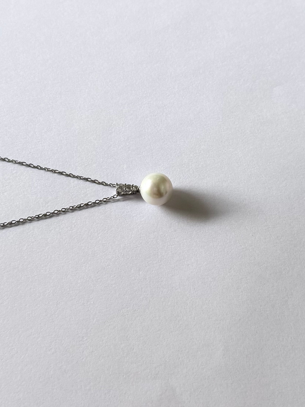 Three diamond style pearl pendant 10mm natural freshwater pearl 925 sterling silver with cz accents classic necklace_closeup_side